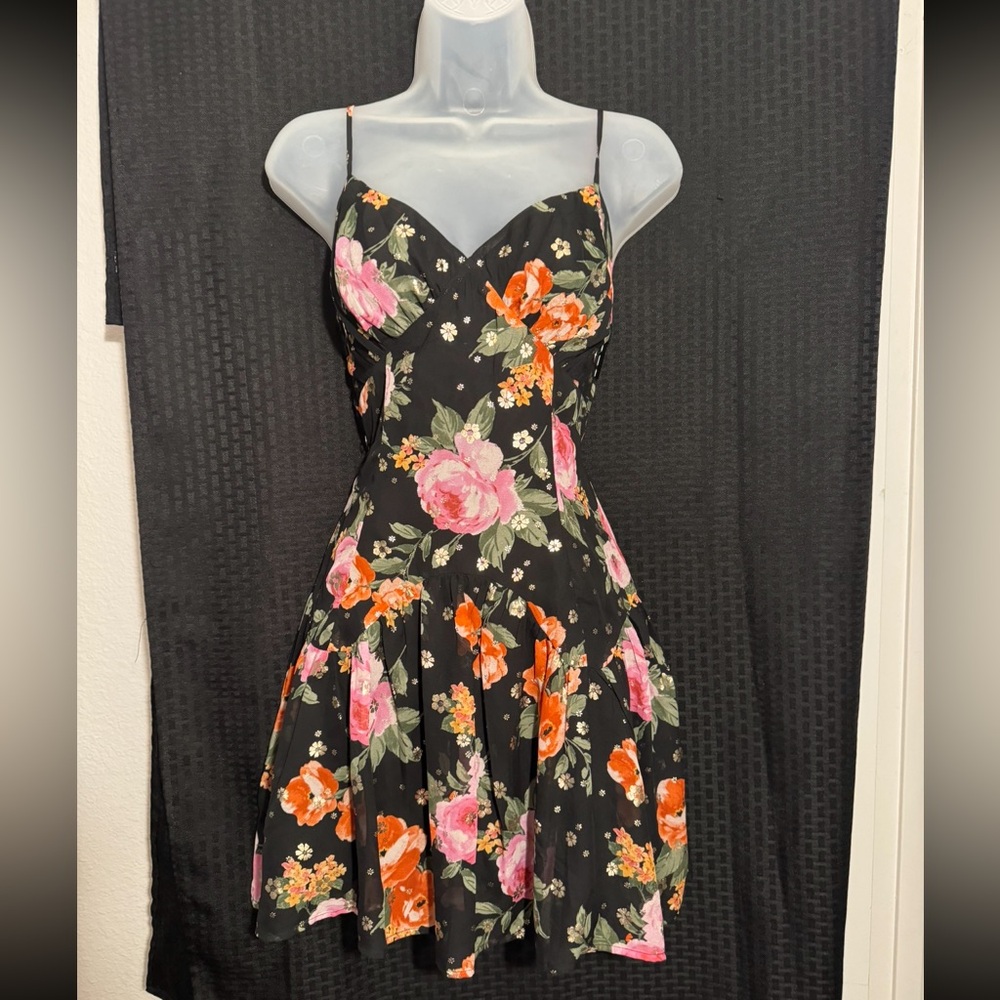 Black dress with colorful floral pattern